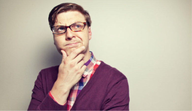 man scratches his chin pondering root canal therapy